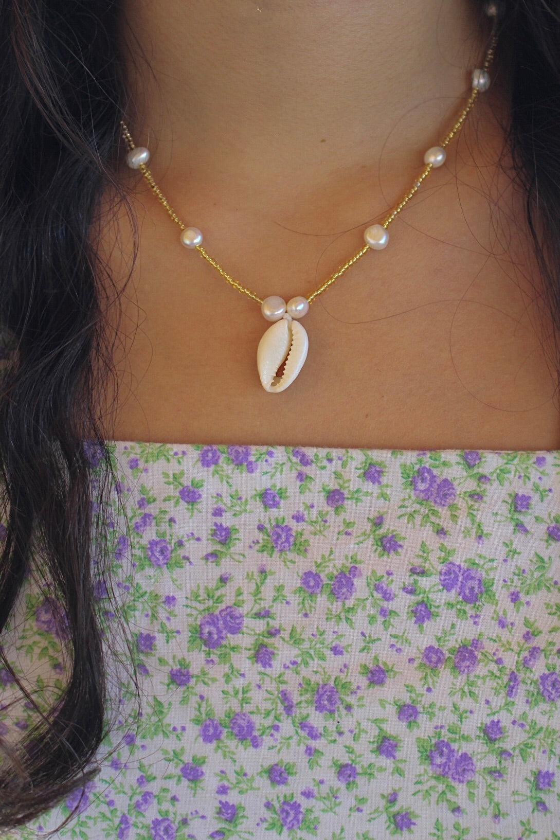 Golden pearl necklace