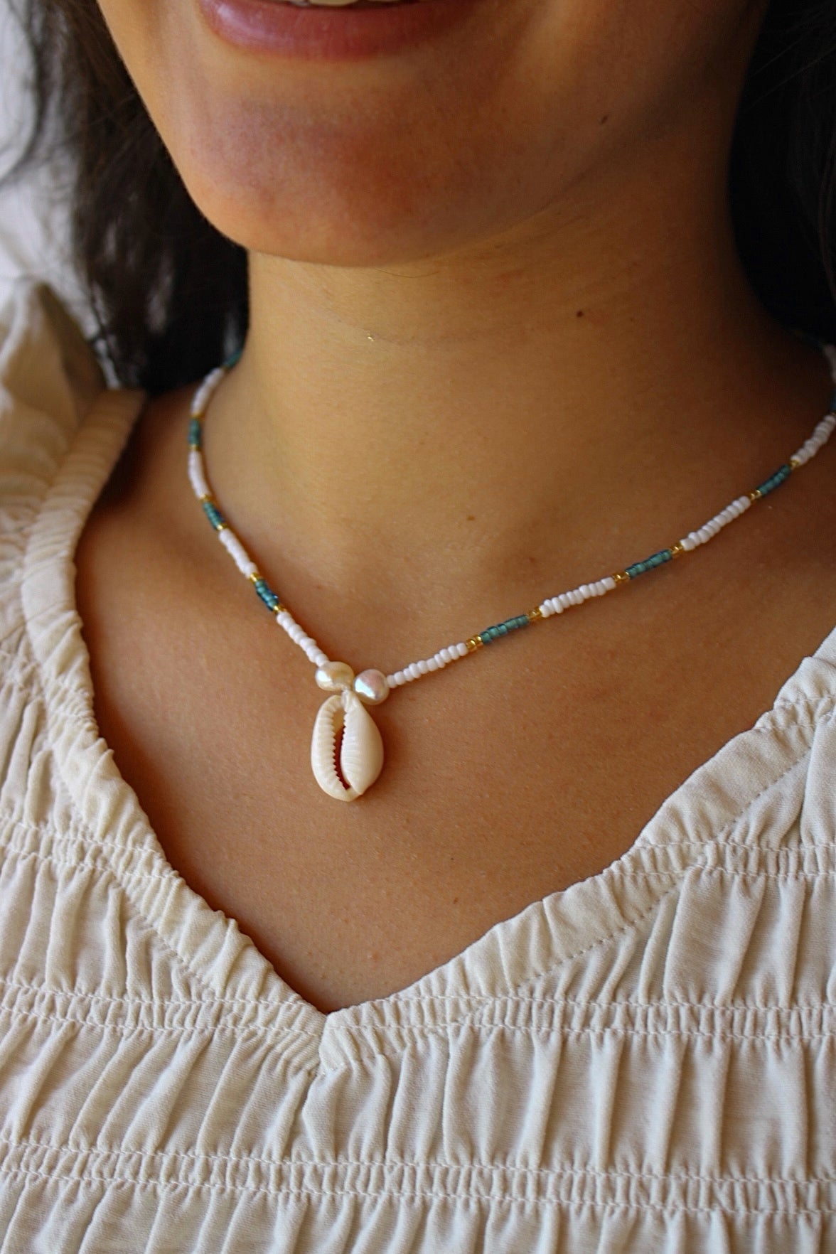 Blue cowrie shell necklace