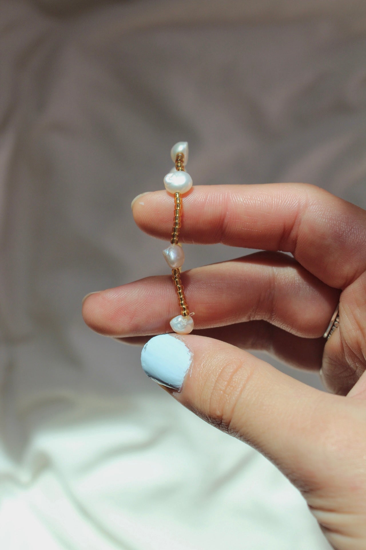 Dainty gold and pearl bracelet