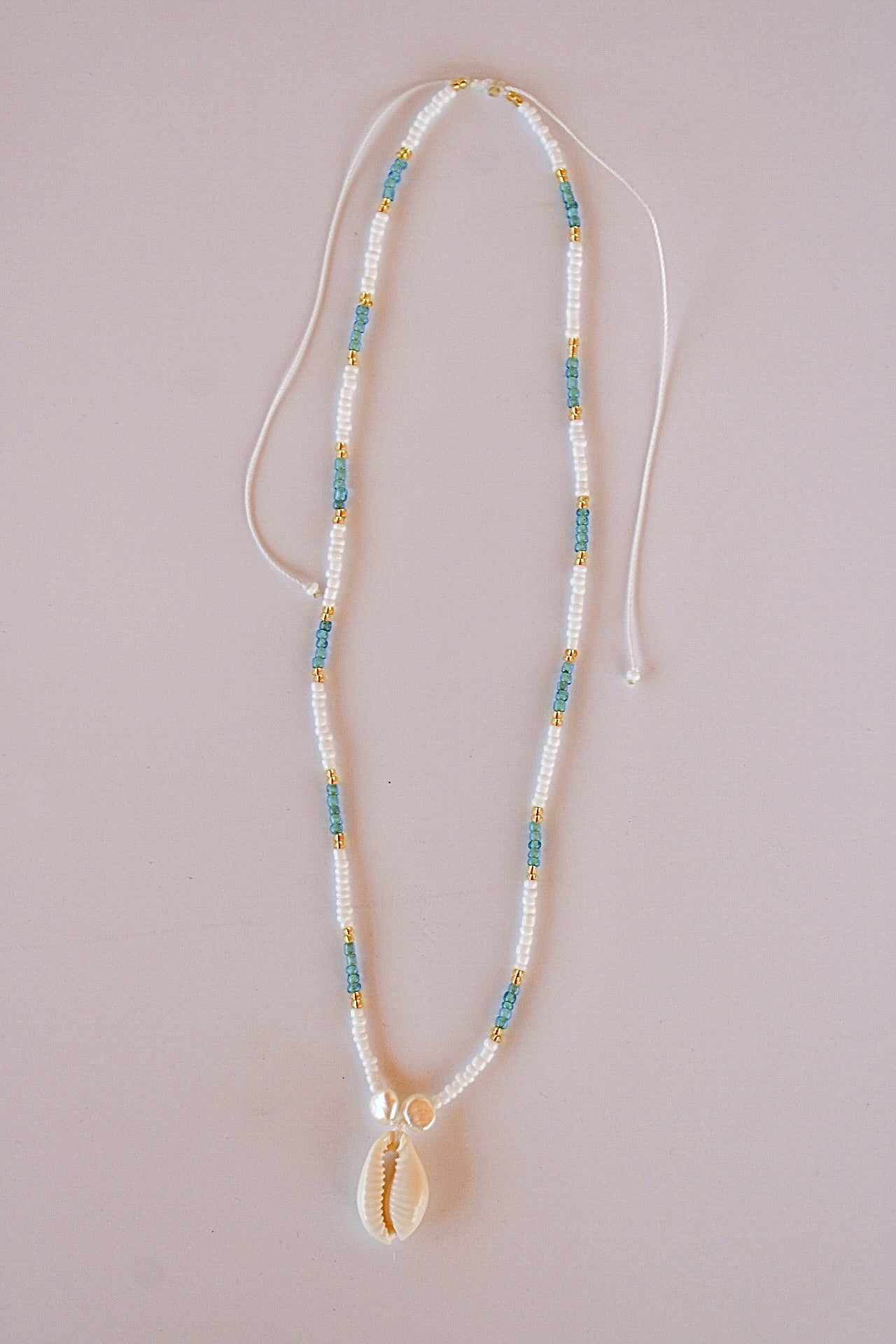 Blue cowrie shell necklace